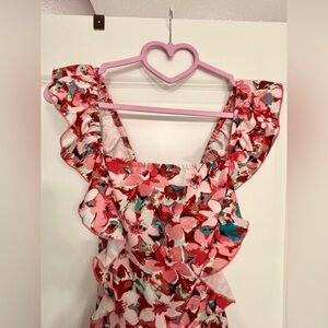 Two Floral dress rompers.